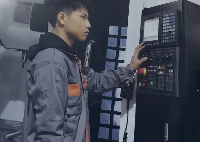 Engineer repairing machine on-site